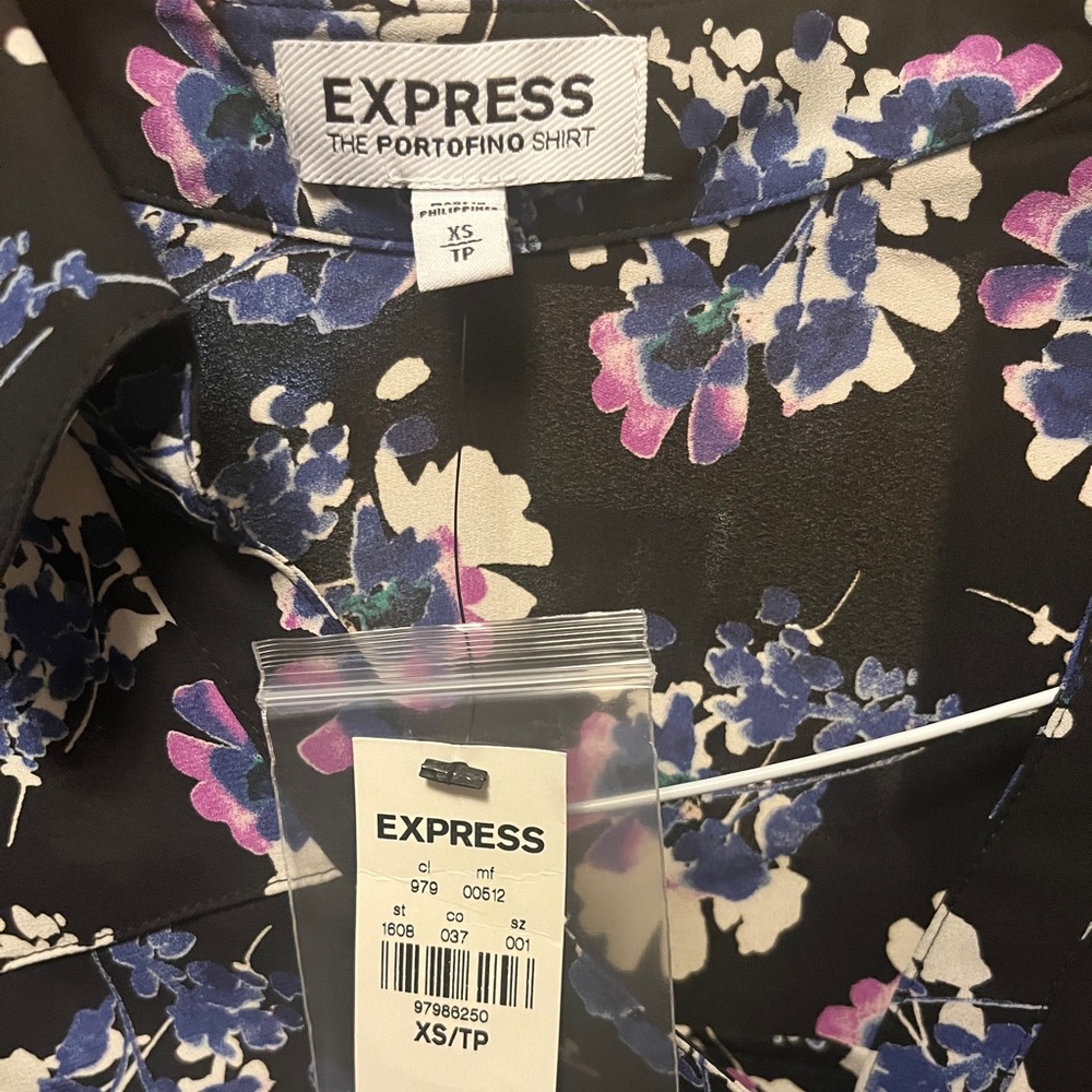 Express size xs floral woman’s blouse 100% polyester